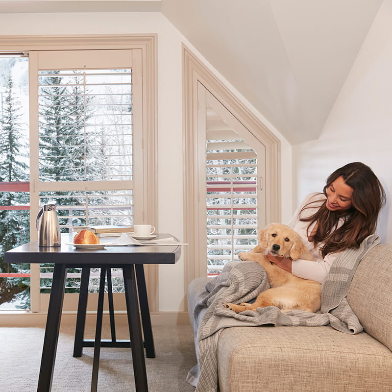 women with dog in room